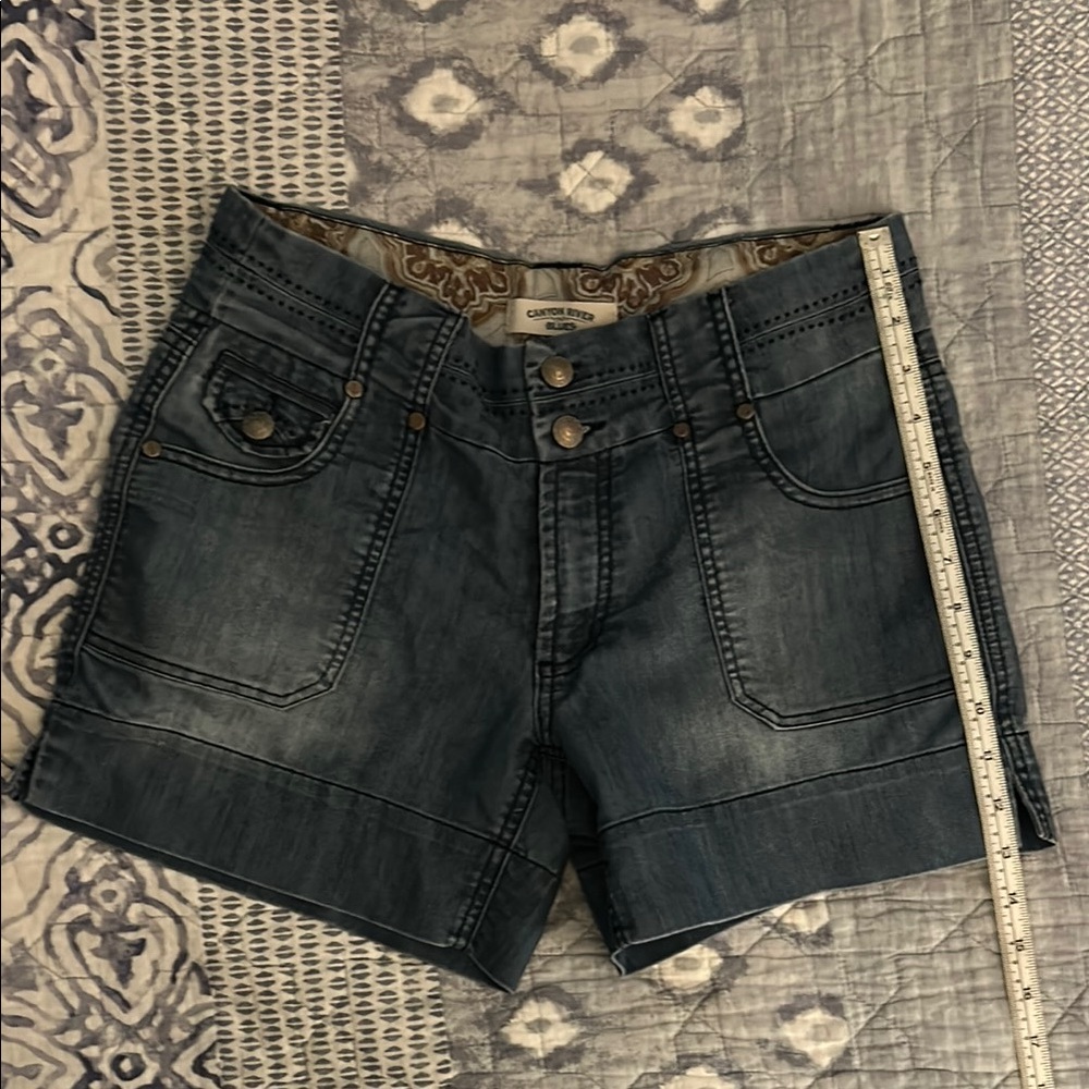 Canyon River Blues Blue Jean Shorts with Distressed Details